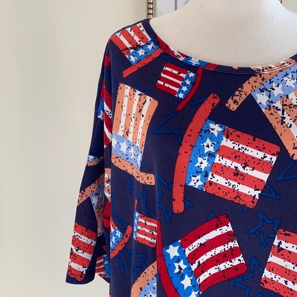 • Lularoe Irma Top • - Picture 1 of 5